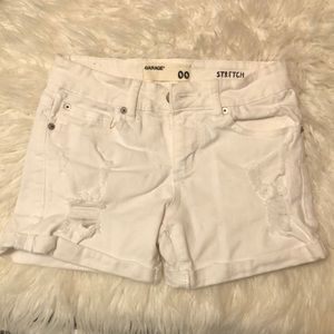 White Shorts with a few stylish rips.